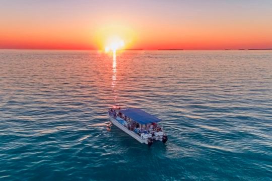 Key West Sunset Harbor Cruise with Premium Drinks, Hors-d’oeuvres and FREE shuttle to location