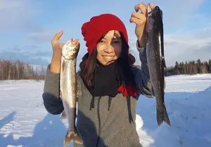 Fairbanks Ice Fishing Expedition in a Heated Cabin with Fish Cookout