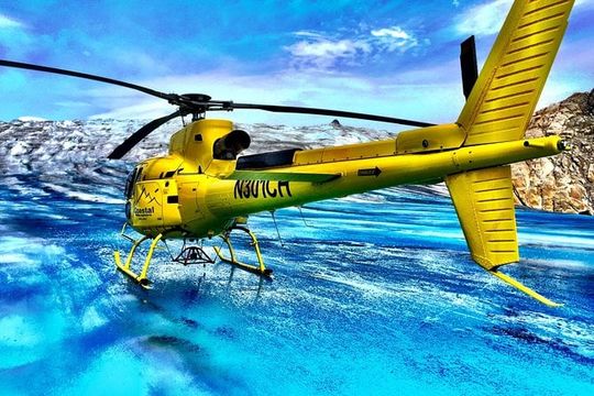 Helicopter to a Dogsledding Experience with a Glacier Landing