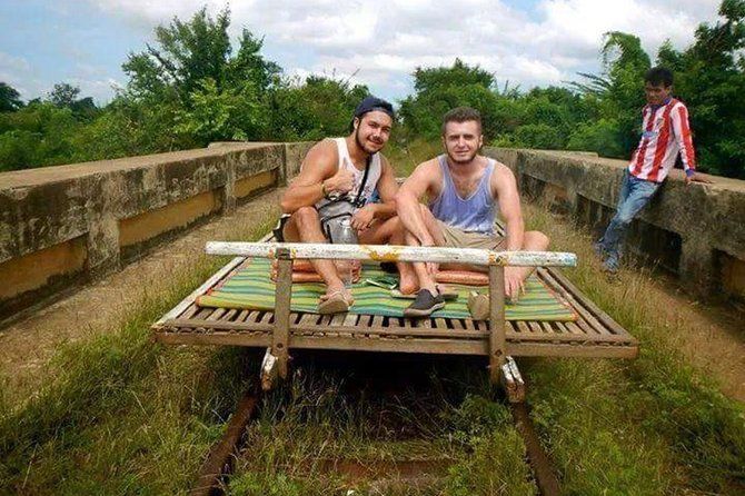 Afternoon tour by tuk tuk to bamboo train,bat cave,killing cave,countryside.