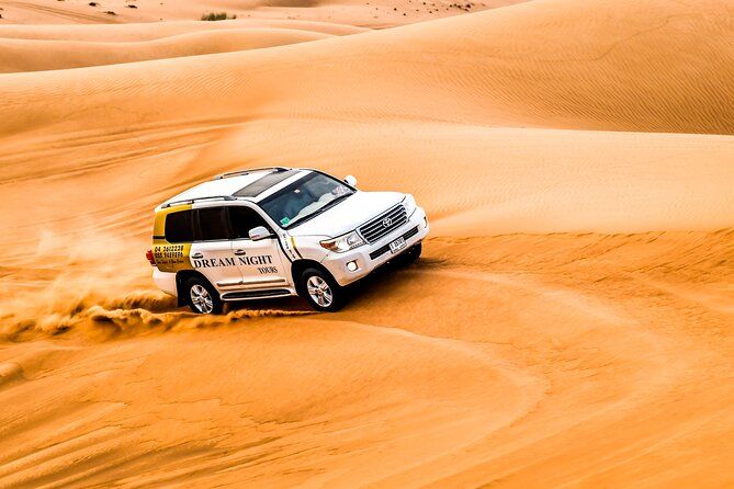 Dubai Desert Safari With Dune Bashing, Camel Ride & BBQ Dinner