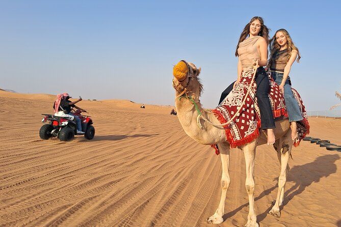 Dubai Evening Desert Safari, Quad Bike, Camel Ride & BBQ Dinner