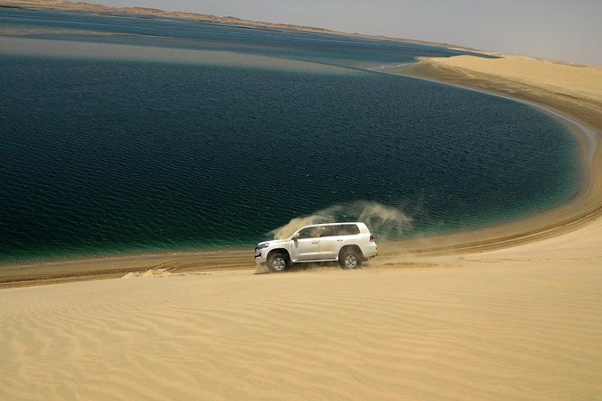Doha: Desert Safari with Camel Ride, Sand Boarding & Inland Sea