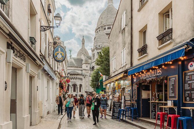 Paris in A Day: Louvre, Eiffel Tower, Notre Dame & Seine Cruise