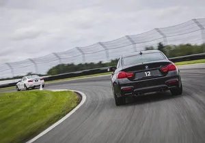 Racecar Driving Experience via Private Helicopter from NYC