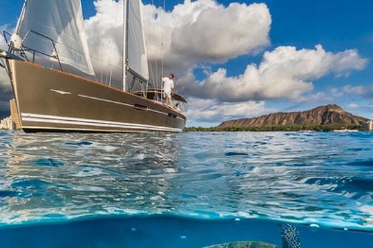 Explore Turtle Canyons Waikiki Snorkel and Sail Adventure