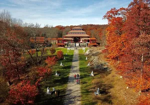 Chuang Yen & Woodbury 1-Day Tour from NYC | Kids 50% Off