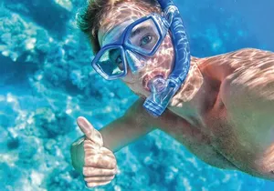 Arch Boat Tour and Snorkeling at Pelican Rock