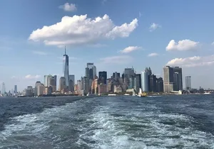 Small van group tour and take the free ferry by lady liberty