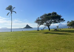 Paddle boarding and hiking adventure at Mokoli'i Island.