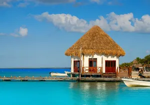 Holbox and Passion Island Full-Day Tour with Cenote, Transportation and Lunch