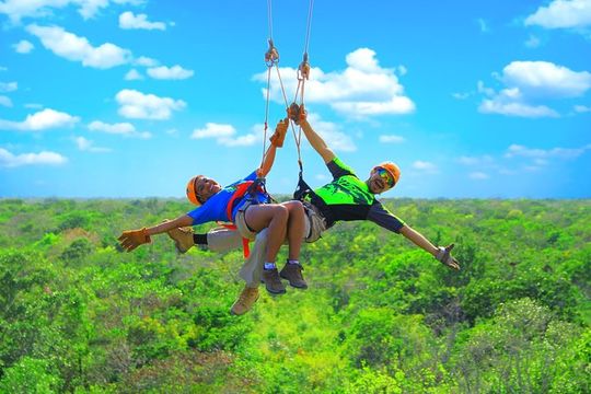 Discover an amazing world:Cenote exploration and jungle soaring. Buffet included