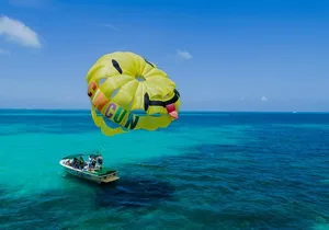 Fly Above Cancun Bay: Parasailing Experience