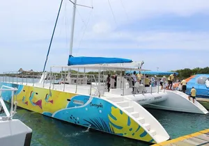 Catamaran Adventure to Isla Mujeres with Snorkeling & Beach Club