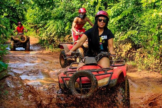 Drive an Atv shared, swim in a Cenote and ziplines in the Cancun