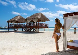 Full day pass in the best Beach Club in the Riviera Maya. Transport included