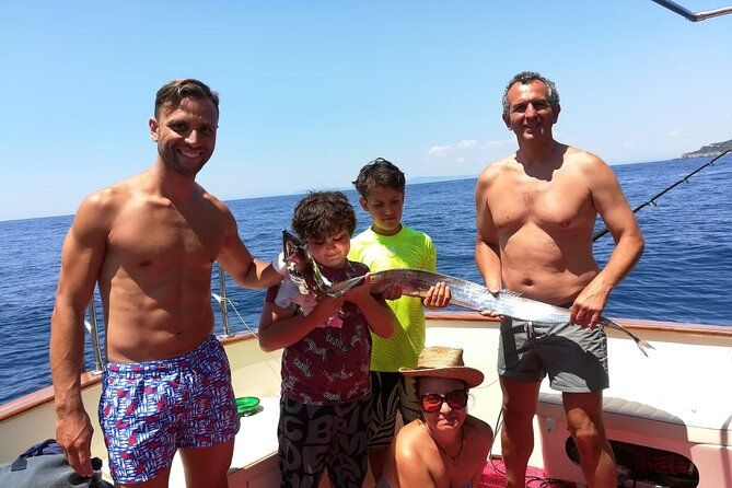 Private fishing tour with visit of Capri, lunch on board,swimming