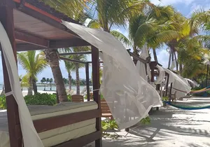 Beach Club tour with beautiful views of the Caribbean Sea. Transport included