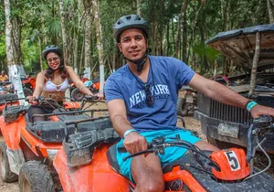 Drive an Atv shared, swim in a Cenote and ziplines in the Cancun