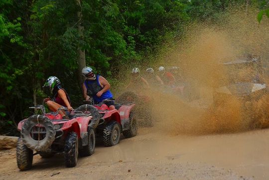 Drive an ATV in middle of the Jungle. Ziplines & cenote included.