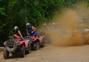 Drive an ATV in middle of the Jungle. Ziplines & cenote included.