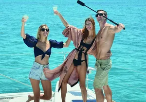 Luxury Catamaran to Isla Mujeres + Private Beach Club with Open Bar