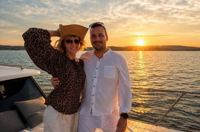 Dolphin Searching Sunset Cruise with Bottle of Cava & Snacks