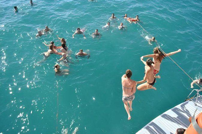 Catamaran ride and swim stop from the port of Valencia