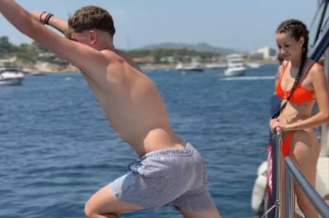 Catamaran ride and swim stop from the port of Valencia