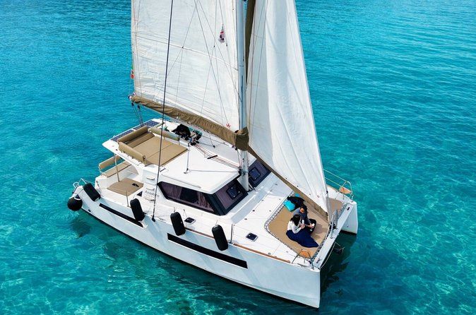 Catamaran tour stops bathing and snorkeling toast with prosecco