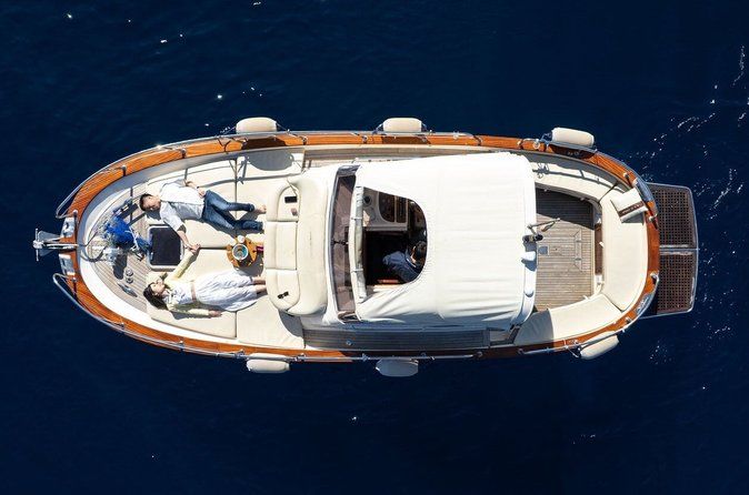 Three Hour Private Guided Tour of Capri with a luxury Gozzo cabin cruiser