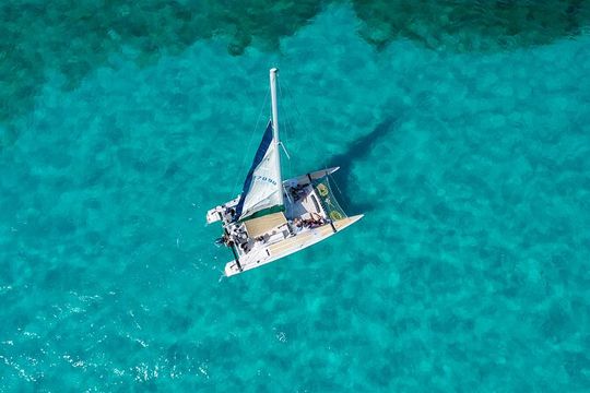 Isla Mujeres Full-Day Catamaran Tour – Buffet, Open Bar & Pickup