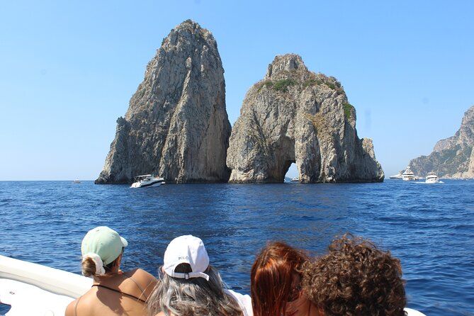 Exclusive Boat Tour from Capri with Swim Stop and Aperitif