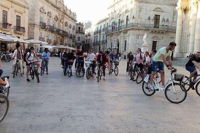 Tour in bike history Island Ortigia and archeological park Neapolis