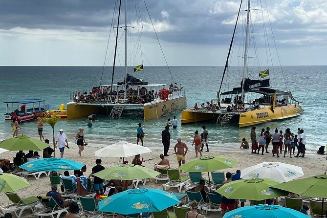 Negril 7 mile Beach, Party Catamaran Cruise, Snorkeling and Ricks Cafe Combo