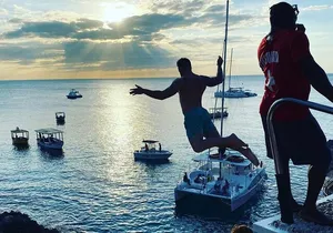 Negril 7 mile Beach, Party Catamaran Cruise , Snorkeling and Ricks Cafe Combo