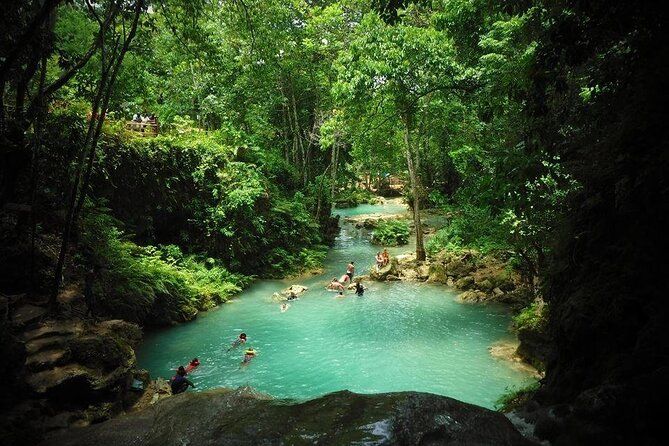 Visit Dunn's River and Secret Falls Tour with River Tubing and Lunch in Jamaica