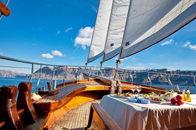 Santorini Caldera Sunset Sailing Cruise with Dinner and Wine