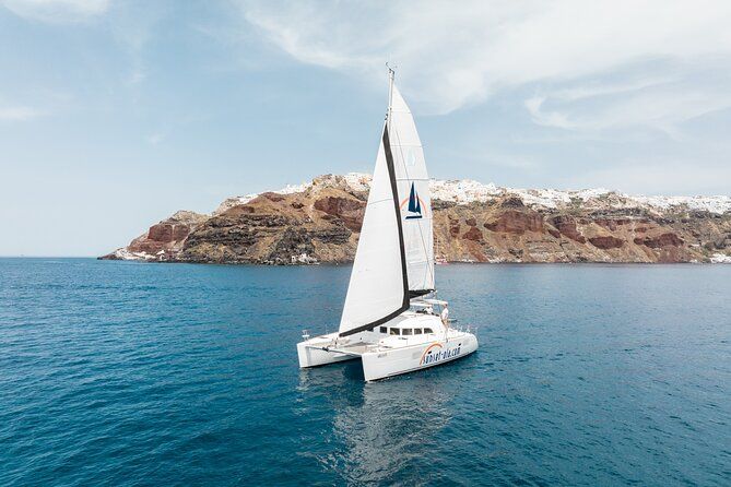 Private Morning Tour Lagoon 400-380 Sailing in Santorini,lunch, drink, transfer