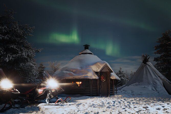 Northern lights safari by snowmobile