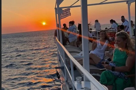 Rhodes Sunset Cruise: Swim, Greek Dinner, Wine & Live Music