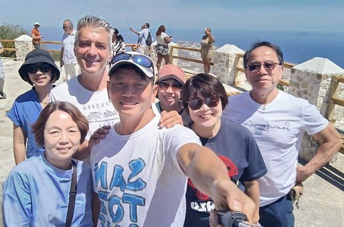 Oia Water Transfer Experience: Cruise One Way, Drive Back to Fira