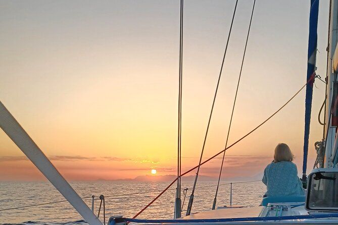 Private sunset cruise in Rhodes with fruits and drinks.