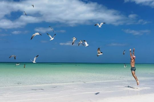 Full Day Tour of Isla Holbox and Isla Pasión with Cenote