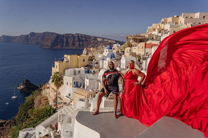 Flying Dress Photoshoot in Oia Private entry to Blue Dome
