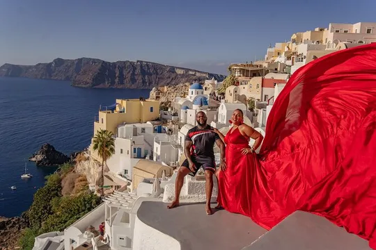 Flying Dress Photoshoot in Oia Private entry to Blue Dome