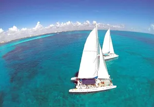 Catamaran tour to Isla Mujeres with snorkeling, open bar