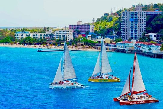 Bamboo Rafting and Party Catamaran Cruise in Montego Bay