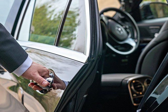 Full day luxury car with driver at disposal in Santorini