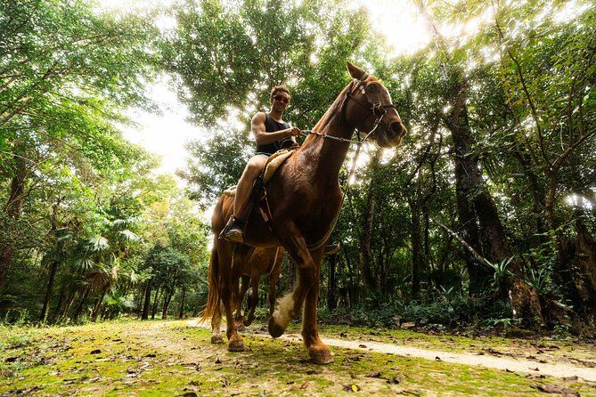 Cancún Jungle Combo Tour: Horseback Ride, ATV, Zip-Lines & Cenote